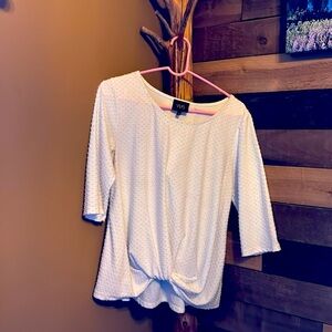 Off-white lightly tufted top